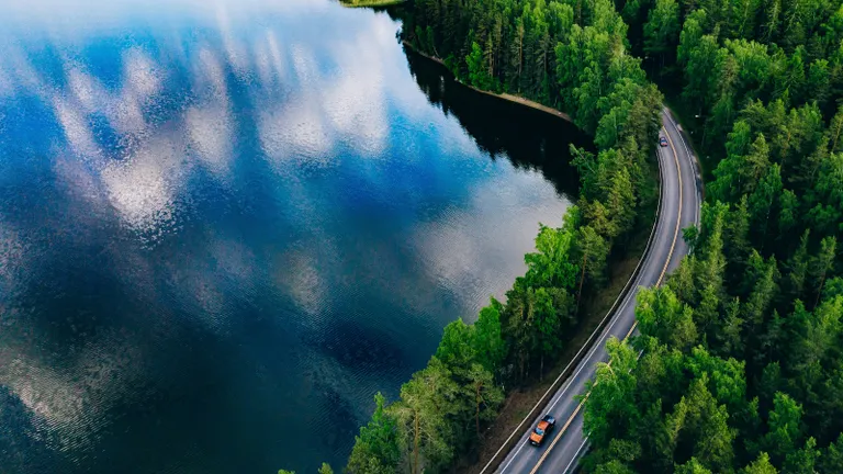 2 cars and lake